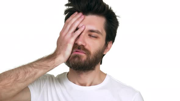 Caucasian Man Tired Trying to Sober Up on White Background