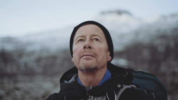 Mature Hiker Enjoying Landscape