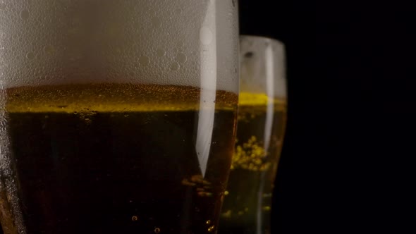 Cold Beer Fizzling in Goblets