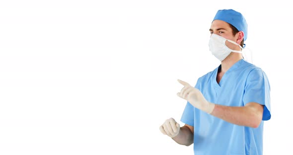 Surgeon pretending to be using futuristic digital screen