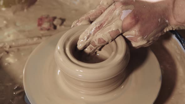 Pottery Crafting  Hands Forms Clay in the a Pot Shape