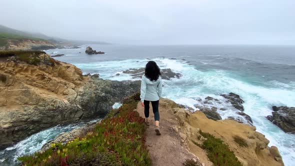 Asian Woman Hiking In Big Sur California