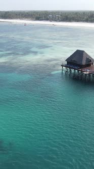 Tanzania  Vertical Video House on Stilts in the Ocean on the Coast of Zanzibar Slow Motion