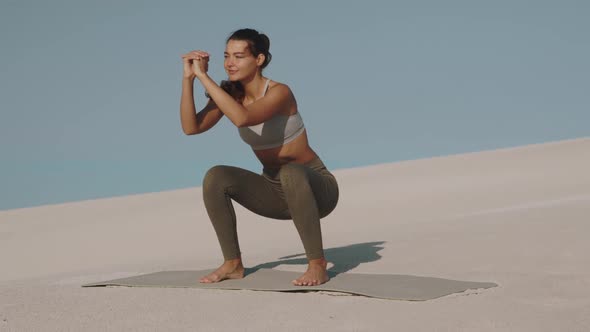 Workout of Sporty Woman on the Beach