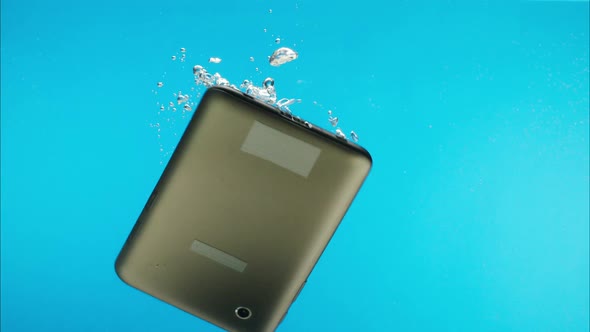 Drowning Smartphone in Water Closeup Throwing Mobile Phone Into a River or Lake Ocean Pollution and