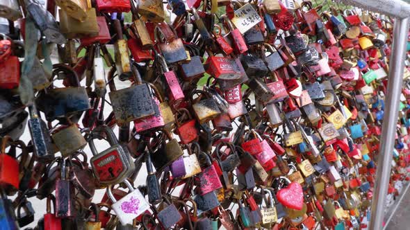 Many Colorful Locks Hanging on Handrails on Love Bridge in Salzburg, Austria