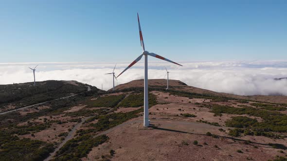 Panoramic shot windmill turbines park above the clouds, Madeira Island