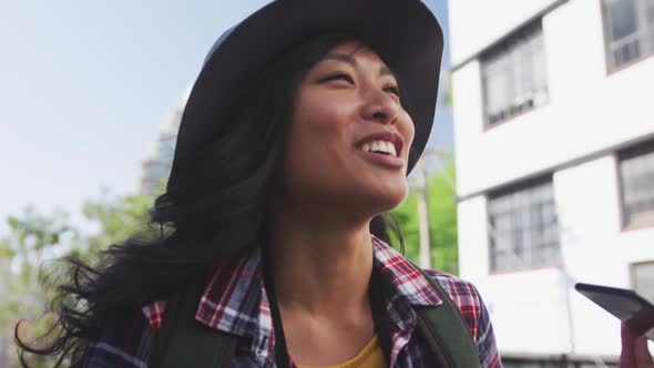 Mixed race woman on the phone