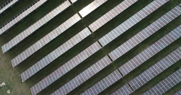 4K Aerial footage of photovoltaic solar farm. Solar farm power station from above.