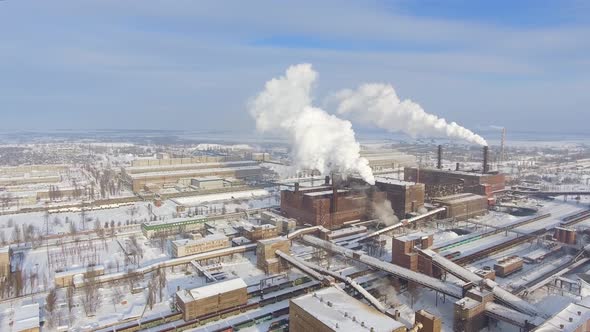 Aerial View of Smoking Pipes in Industrial Zone in Winter