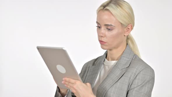 Businesswoman Browsing Internet on Tablet, White Background