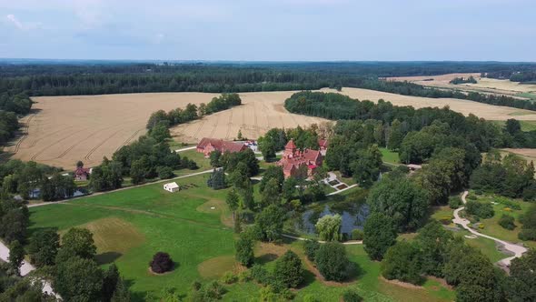 Jaunmoku Brick Medieval Castle Near Tukums, Latvia  Aerial Dron 4k Shot Jaunmokas Manor Park