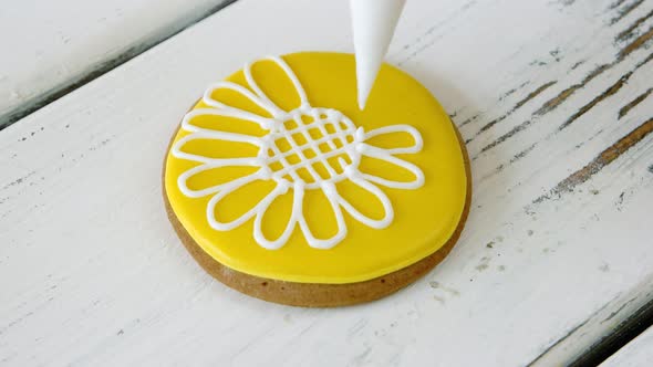 Decoration of Yellow Cookie with White Flower