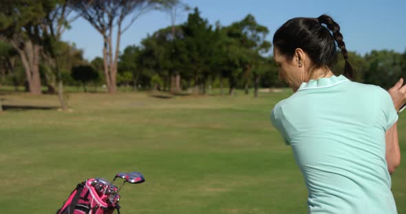 Golfer playing golf