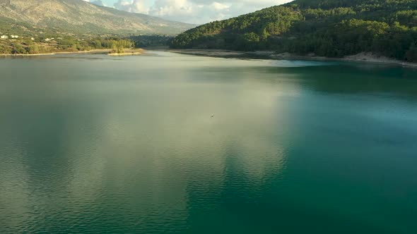 Sunset Over the River in the Mountains Filmed on a Drone