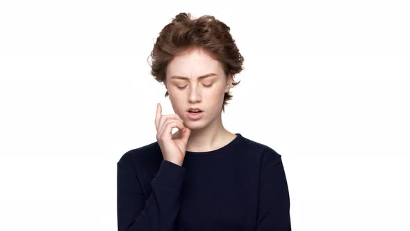 Portrait of Focused Woman with Brown Curly Hair Hesitating and Trying to Remember or Choose Over