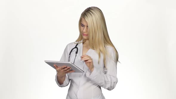 Medical Doctor Working with Laptop. White