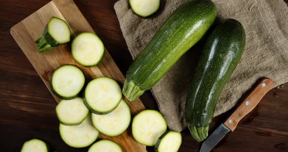 Sliced Zucchini on a Cutting Board Rotates Slowly. 