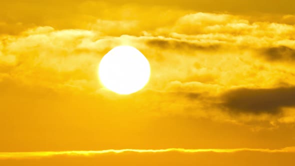 Dramatic Sunset in the Sky Through Orange Layered Cumulus Clouds Timelapse