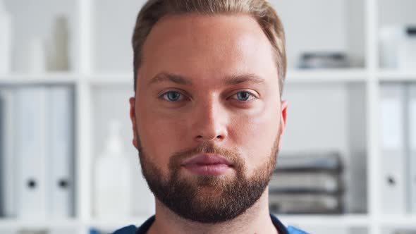 Professional medical doctor in hospital office, Portrait of young and confident physician.