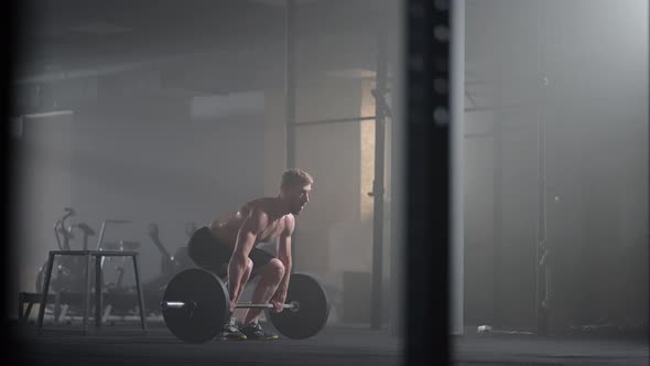 Slow Motion of Crossfit Athlete Performs Clean and Jerk