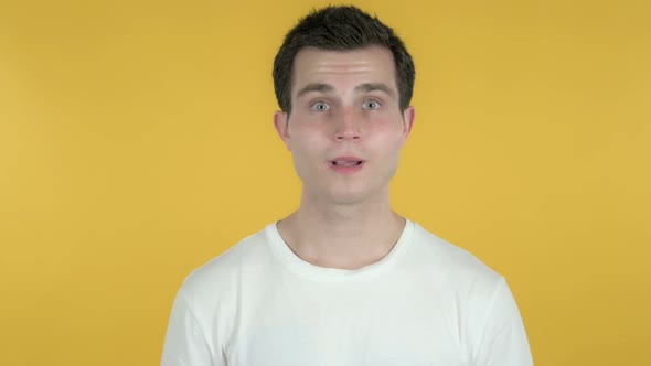 Yes, Man Shaking Head To Accept, Yellow Background