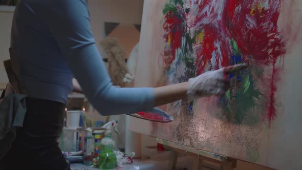 Talented Female Artist Working on a Modern Abstract Oil Painting Uses Splattering and Dripping with