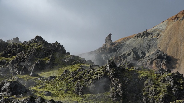 Iceland. Geothermal field with fumaroles and geysers. Natural steam vents. Smoking fumaroles.