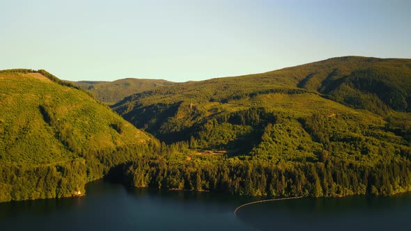 Bird'seye View of the Sunrise Over the River with Hilly Terrain