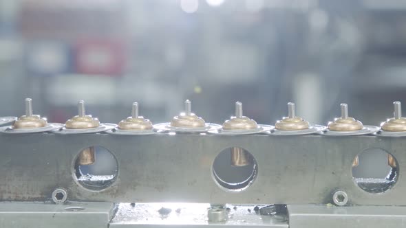 Automated assembly line for metal parts in the automotive industry