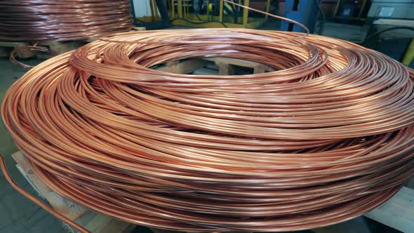 Copper Wire is Unwinding From a Pile