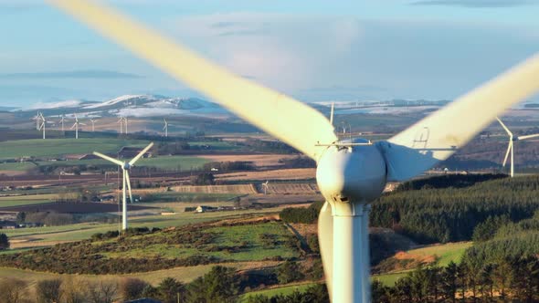 Wind Farm Turbines at Sunset Generating Renewable Power