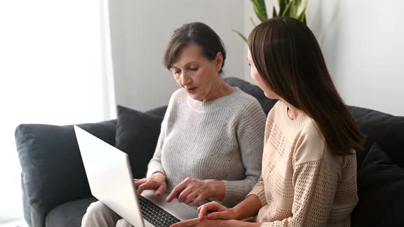 A Senior Mother and an Adult Daughter Spend Time Together