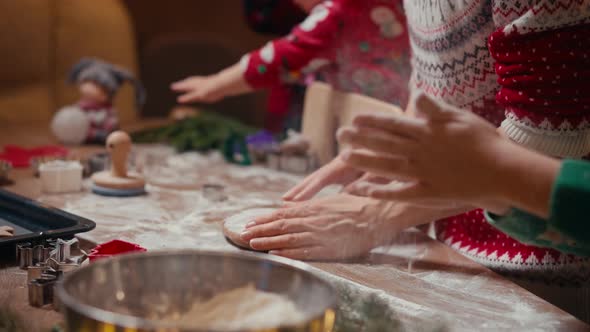 Family with Three Kids Cooking Ginger Cookies