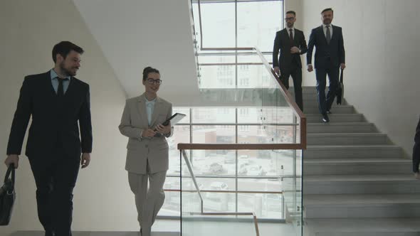 Business People on Stairwell