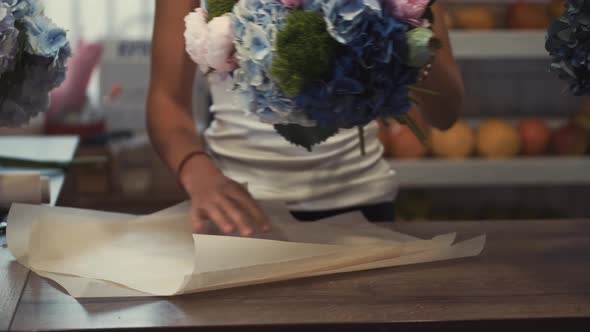 Florists Making Beautiful Flower Bouquet at the Florist Shop