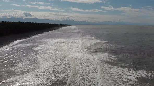 Drone flying over of big waves in Shekvetili sand beach