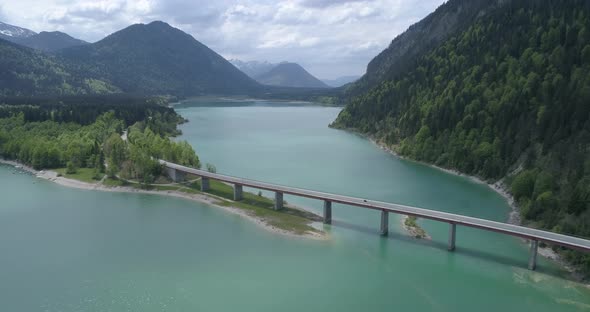 Bridge over mountain lake reservoir, Sylvenstein, Bavaria, Germany