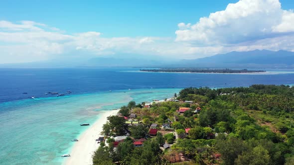 Aerial top view scenery of relaxing shore beach adventure by blue green ocean and white sandy backgr