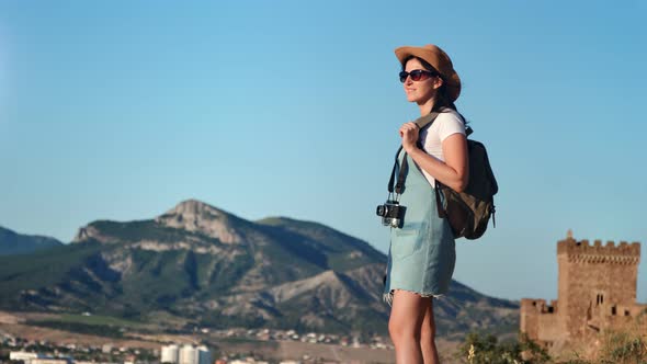 Active Backpack Travel Woman Standing on Top of Mountain Admiring Amazing Landscape