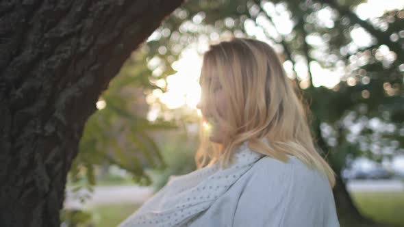 Plus Size Blond Girl Hide in White Scarf at Sun Park