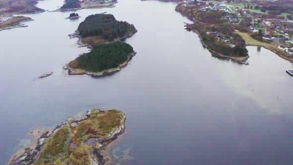 Aerial Orbit Shot Over Islands And Coastline in More and Romsdal County, Norway. - Drone