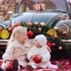 Two Little Girls are Photographed in Christmas Decorations - VideoHive Item for Sale