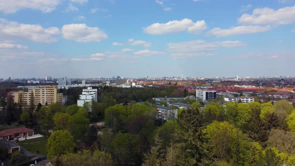 Perfect fluffy clouds in the blue sky over the capital of Germany. Gorgeous aerial view flight fly b