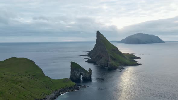 Drone Towards Drangarnir Sea Stacks In Faroe Islands