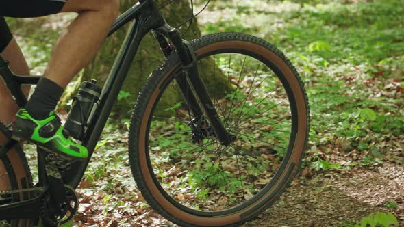 A Cyclist is Riding a Bicycle