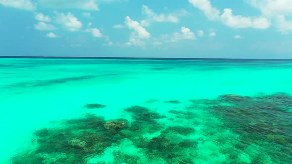 Natural drone island view of a paradise sunny white sand beach and aqua turquoise water background i