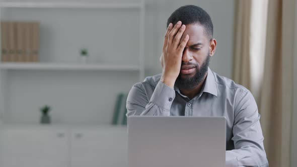 Depressed African Businessman Frustrated After Reading Bad News Feel Upset Having Problem Feels