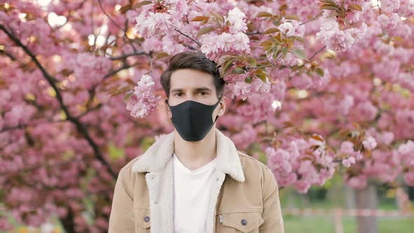 European man on street wearing face protection Virus mask in prevention for coronavirus covid 19. 