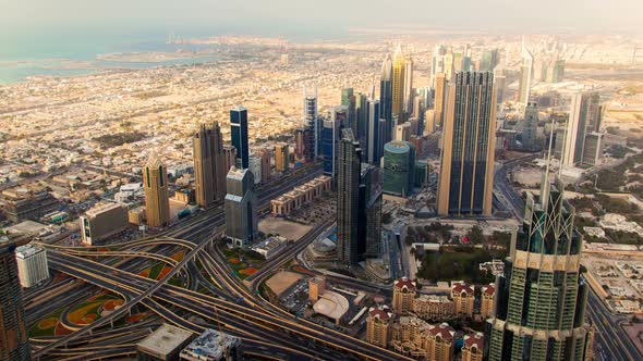 Dubai Panorama of Big Highway Intersection with Heavy Traffic and Tall Skyscrapers Time-lapse